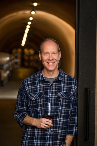 Marc Nanes in the oak barrel-filled caves of Kenzo Estate winery